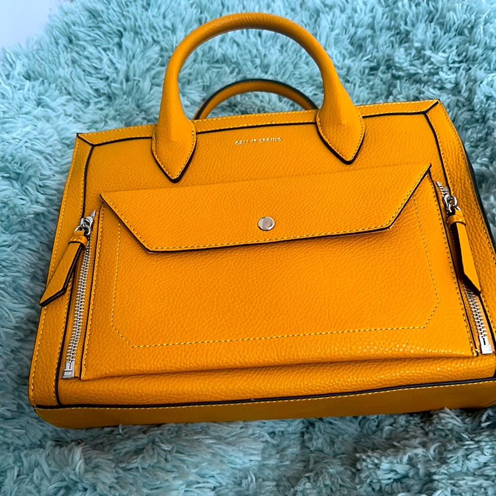 Brand new call it spring yellow bag.